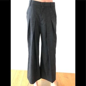 Dark grey gucci pants.